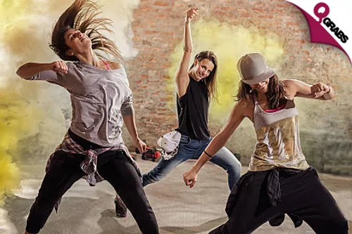 From QR300 Get in Shape with 12 Sessions of Zumba OR Yoga OR Full Body Workout Classes for LADIES! (Up to QR720 Value)